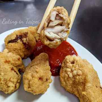 Deep fried fish balls with spicy sauce