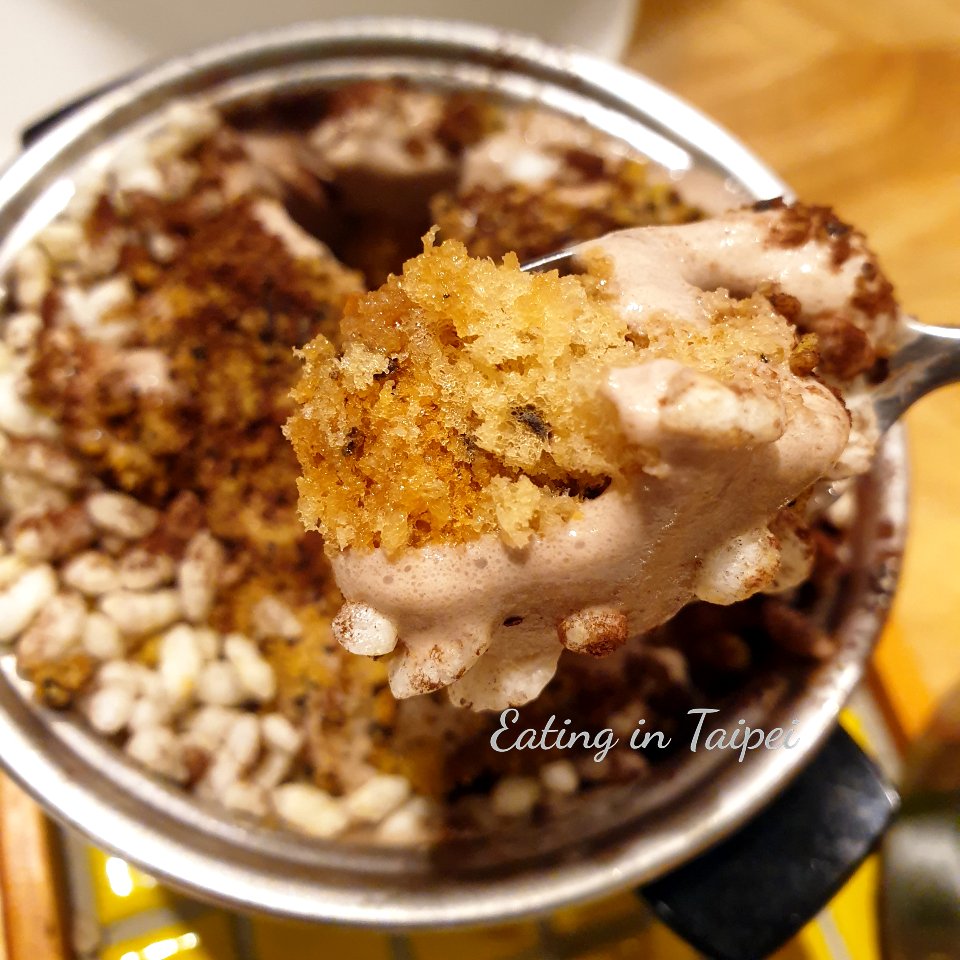 Layers of sponge, mousse, and crispy puffed rice were found inside